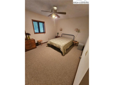 Welcome to this 3-bedroom, 3-bath mountain home with bonus room on Beech Mountain Club in North Carolina - for sale on GolfHomes.com, golf home, golf lot