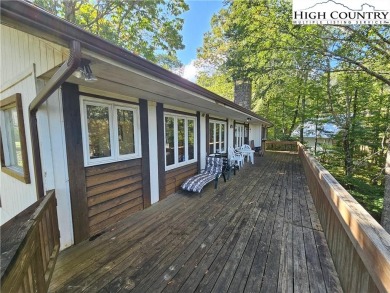 Welcome to this 3-bedroom, 3-bath mountain home with bonus room on Beech Mountain Club in North Carolina - for sale on GolfHomes.com, golf home, golf lot