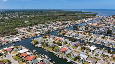This isn't just a home, It's a LIFESTYLE! Welcome to this on Gulf Harbors Golf Course in Florida - for sale on GolfHomes.com, golf home, golf lot