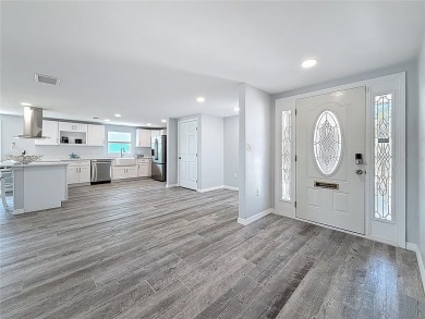 This isn't just a home, It's a LIFESTYLE! Welcome to this on Gulf Harbors Golf Course in Florida - for sale on GolfHomes.com, golf home, golf lot