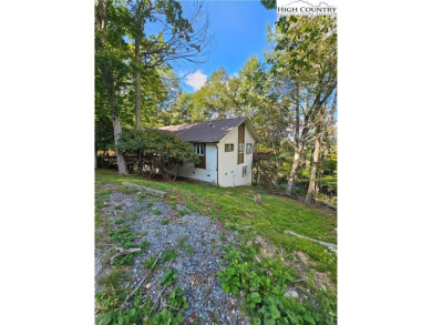 Welcome to this 3-bedroom, 3-bath mountain home with bonus room on Beech Mountain Club in North Carolina - for sale on GolfHomes.com, golf home, golf lot