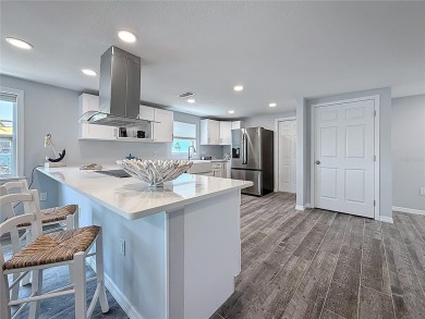 This isn't just a home, It's a LIFESTYLE! Welcome to this on Gulf Harbors Golf Course in Florida - for sale on GolfHomes.com, golf home, golf lot