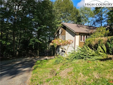 Welcome to this 3-bedroom, 3-bath mountain home with bonus room on Beech Mountain Club in North Carolina - for sale on GolfHomes.com, golf home, golf lot