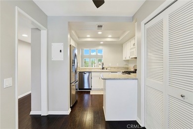 Welcome to this spacious 3-bedroom, 2-bath upper-level condo on Mission Viejo Country Club in California - for sale on GolfHomes.com, golf home, golf lot