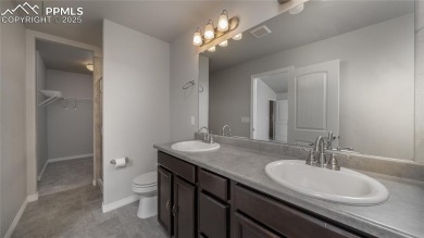This beautiful 4-bedroom, 3-bathroom home in District 49's on Antler Creek Golf Course in Colorado - for sale on GolfHomes.com, golf home, golf lot