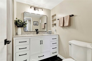 Welcome to this spacious 3-bedroom, 2-bath upper-level condo on Mission Viejo Country Club in California - for sale on GolfHomes.com, golf home, golf lot