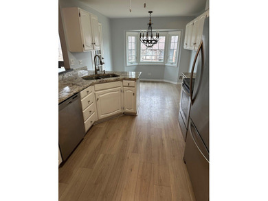 Welcome to this spacious and inviting 3-bedroom, 2-bath on Oak Hills Country Club in Illinois - for sale on GolfHomes.com, golf home, golf lot