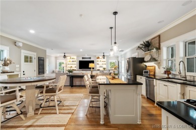 This fully remodeled home offers the perfect blend of privacy on Osage National Golf Club in Missouri - for sale on GolfHomes.com, golf home, golf lot