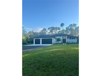 Experience the best of Golden Gate Estates living in this on The Club At Twin Eagles in Florida - for sale on GolfHomes.com, golf home, golf lot