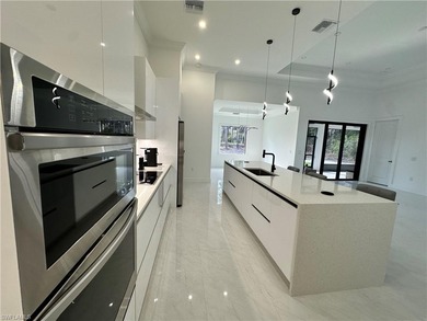 Experience the best of Golden Gate Estates living in this on The Club At Twin Eagles in Florida - for sale on GolfHomes.com, golf home, golf lot