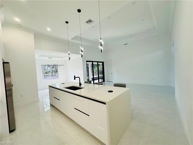 Experience the best of Golden Gate Estates living in this on The Club At Twin Eagles in Florida - for sale on GolfHomes.com, golf home, golf lot