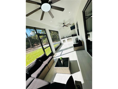 Experience the best of Golden Gate Estates living in this on The Club At Twin Eagles in Florida - for sale on GolfHomes.com, golf home, golf lot