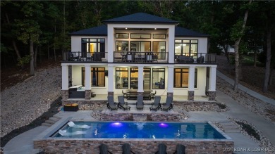 2023 construction, stunning home and is TURNKEY! Stucco & stone on The Club At Porto Cima in Missouri - for sale on GolfHomes.com, golf home, golf lot