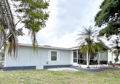 Relax on the lanai or patio of this charming, well-maintained on Del Tura Golf and Country Club in Florida - for sale on GolfHomes.com, golf home, golf lot