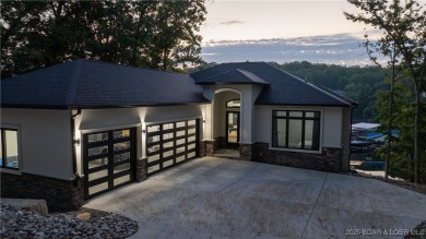 2023 construction, stunning home and is TURNKEY! Stucco & stone on The Club At Porto Cima in Missouri - for sale on GolfHomes.com, golf home, golf lot