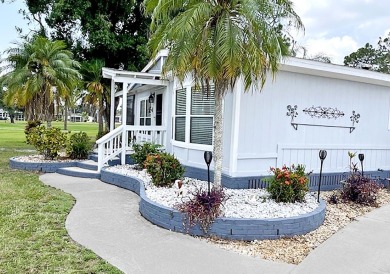 Relax on the lanai or patio of this charming, well-maintained on Del Tura Golf and Country Club in Florida - for sale on GolfHomes.com, golf home, golf lot