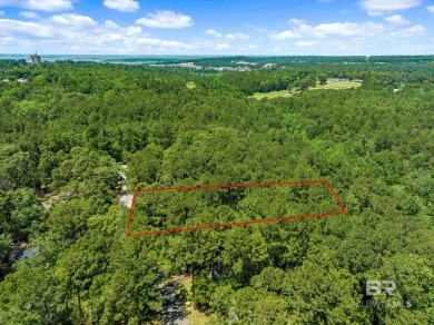 Check out this beautiful wooded lot in the sought-after Lake on Lake Forest Yacht and Country Club in Alabama - for sale on GolfHomes.com, golf home, golf lot