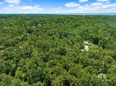 Check out this beautiful wooded lot in the sought-after Lake on Lake Forest Yacht and Country Club in Alabama - for sale on GolfHomes.com, golf home, golf lot
