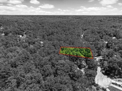 Check out this beautiful wooded lot in the sought-after Lake on Lake Forest Yacht and Country Club in Alabama - for sale on GolfHomes.com, golf home, golf lot