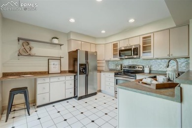 This townhome is ideally located in a quiet neighborhood backing on Country Club of Colorado in Colorado - for sale on GolfHomes.com, golf home, golf lot