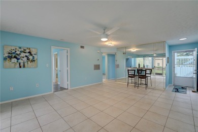 Incredible price reduction! Enjoy this 2 bedroom/2 bath condo on Pelican Pointe 9 Hole Course in Florida - for sale on GolfHomes.com, golf home, golf lot