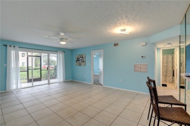 Incredible price reduction! Enjoy this 2 bedroom/2 bath condo on Pelican Pointe 9 Hole Course in Florida - for sale on GolfHomes.com, golf home, golf lot