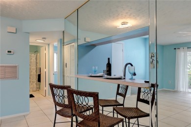 Incredible price reduction! Enjoy this 2 bedroom/2 bath condo on Pelican Pointe 9 Hole Course in Florida - for sale on GolfHomes.com, golf home, golf lot