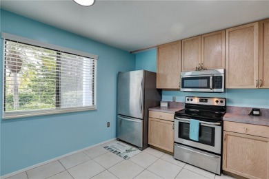 Incredible price reduction! Enjoy this 2 bedroom/2 bath condo on Pelican Pointe 9 Hole Course in Florida - for sale on GolfHomes.com, golf home, golf lot