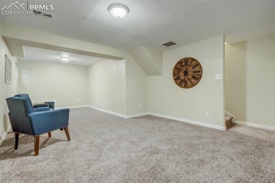 This townhome is ideally located in a quiet neighborhood backing on Country Club of Colorado in Colorado - for sale on GolfHomes.com, golf home, golf lot