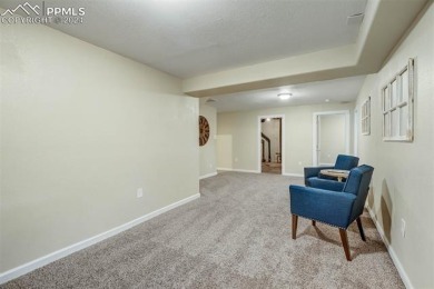 This townhome is ideally located in a quiet neighborhood backing on Country Club of Colorado in Colorado - for sale on GolfHomes.com, golf home, golf lot