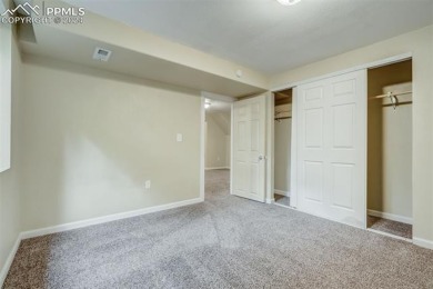 This townhome is ideally located in a quiet neighborhood backing on Country Club of Colorado in Colorado - for sale on GolfHomes.com, golf home, golf lot