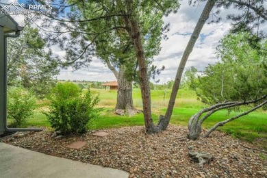 This townhome is ideally located in a quiet neighborhood backing on Country Club of Colorado in Colorado - for sale on GolfHomes.com, golf home, golf lot