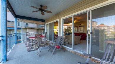 Welcome to your lakeside haven at Palisades Condominiums on Tan-Tar-A Golf Club in Missouri - for sale on GolfHomes.com, golf home, golf lot