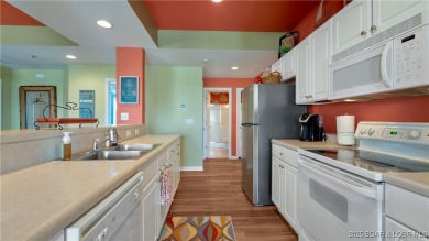 Welcome to your lakeside haven at Palisades Condominiums on Tan-Tar-A Golf Club in Missouri - for sale on GolfHomes.com, golf home, golf lot