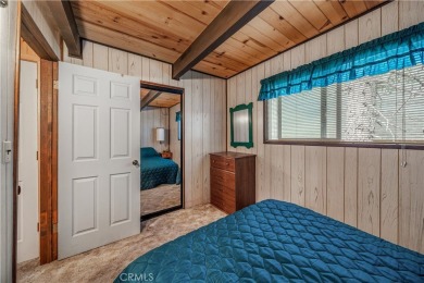 Welcome to this charming 2-story Moonridge cabin, perfectly on Big Bear Mountain Ski and Golf Resort in California - for sale on GolfHomes.com, golf home, golf lot