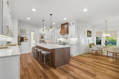 Experience the ultimate in refined living with this stunning 4 on Towne Lake Hills Golf Club in Georgia - for sale on GolfHomes.com, golf home, golf lot