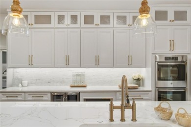 Experience the ultimate in refined living with this stunning 4 on Towne Lake Hills Golf Club in Georgia - for sale on GolfHomes.com, golf home, golf lot