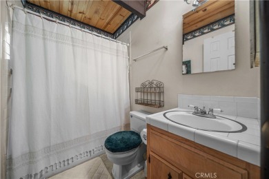 Welcome to this charming 2-story Moonridge cabin, perfectly on Big Bear Mountain Ski and Golf Resort in California - for sale on GolfHomes.com, golf home, golf lot