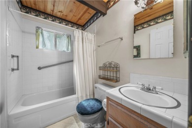 Welcome to this charming 2-story Moonridge cabin, perfectly on Big Bear Mountain Ski and Golf Resort in California - for sale on GolfHomes.com, golf home, golf lot