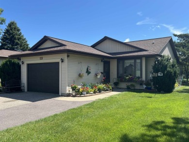 Ranch style stand-alone condo overlooking peaceful hole 4 of on Saddle Ridge Golf Club in Wisconsin - for sale on GolfHomes.com, golf home, golf lot