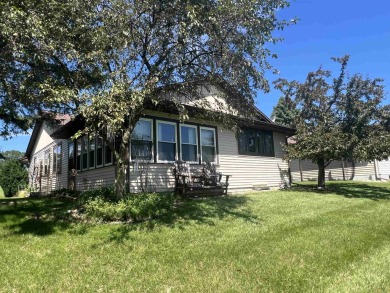 Ranch style stand-alone condo overlooking peaceful hole 4 of on Saddle Ridge Golf Club in Wisconsin - for sale on GolfHomes.com, golf home, golf lot