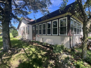 Ranch style stand-alone condo overlooking peaceful hole 4 of on Saddle Ridge Golf Club in Wisconsin - for sale on GolfHomes.com, golf home, golf lot