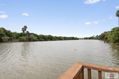 Absolutely gorgeous home with an amazing view to the resaca from on Rancho Viejo Resort and Country Club in Texas - for sale on GolfHomes.com, golf home, golf lot