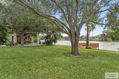 Absolutely gorgeous home with an amazing view to the resaca from on Rancho Viejo Resort and Country Club in Texas - for sale on GolfHomes.com, golf home, golf lot