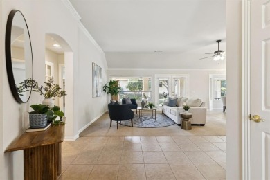 Nestled in a beautifully landscaped setting and shaded by mature on Wildhorse Golf Club of Robson Ranch in Texas - for sale on GolfHomes.com, golf home, golf lot