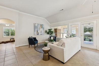 Nestled in a beautifully landscaped setting and shaded by mature on Wildhorse Golf Club of Robson Ranch in Texas - for sale on GolfHomes.com, golf home, golf lot