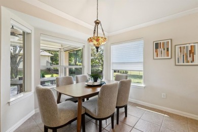 Nestled in a beautifully landscaped setting and shaded by mature on Wildhorse Golf Club of Robson Ranch in Texas - for sale on GolfHomes.com, golf home, golf lot