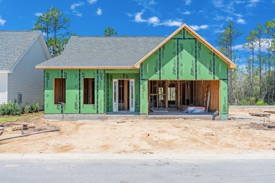 Your next chapter begins in this thoughtfully designed on Origins Golf Club in Florida - for sale on GolfHomes.com, golf home, golf lot