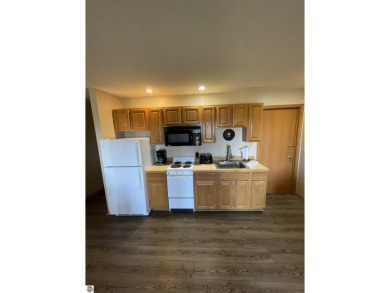 Rare opportunity to own a 3BR/3BA maintenance free condo at NW on A-Ga-Ming Golf Resort in Michigan - for sale on GolfHomes.com, golf home, golf lot