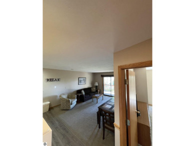 Rare opportunity to own a 3BR/3BA maintenance free condo at NW on A-Ga-Ming Golf Resort in Michigan - for sale on GolfHomes.com, golf home, golf lot